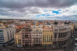 an aerial view of a city with buildings at Petit Palace Alcalá in Madrid