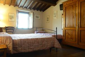 Postel nebo postele na pokoji v ubytování B&B La corte di Stelio