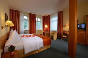 Voodi või voodid majutusasutuse City Partner Hotel Holländer Hof toas