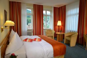 Voodi või voodid majutusasutuse City Partner Hotel Holländer Hof toas