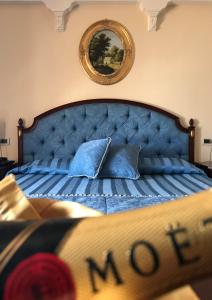 Postel nebo postele na pokoji v ubytování Grand Hotel Palace
