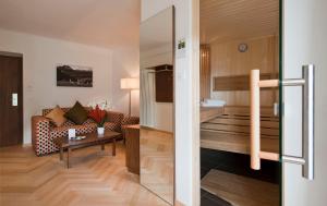 Postel nebo postele na pokoji v ubytování Waldhotel & SPA Davos - for body & soul