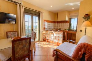 TV a/nebo společenská místnost v ubytování Hotel Rural Sierra Tejeda