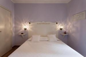 Ένα ή περισσότερα κρεβάτια σε δωμάτιο στο Dimora della Rovere