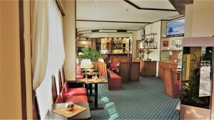 ห้องอาหารหรือที่รับประทานอาหารของ Hotel Accursio