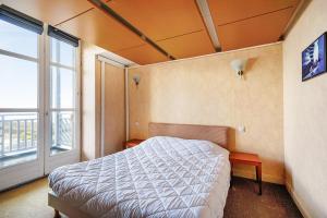 Ένα ή περισσότερα κρεβάτια σε δωμάτιο στο Residence Saint Goustan - maeva Home +93 φωτογραφίες