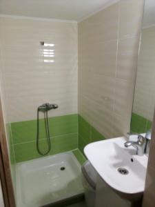 Koupelna v ubytování Pershyy Hostel u Cherkasah