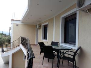 Балкон или терраса в GOUGOUSIS apartments