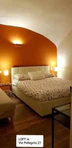 Postel nebo postele na pokoji v ubytování Talismano Luxury Suite & Loft & Alcova & Maison + 11 fotografií