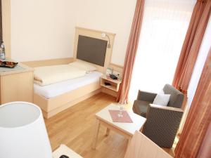Postel nebo postele na pokoji v ubytování Wellness- und Wohlfühlhotel Waldeck