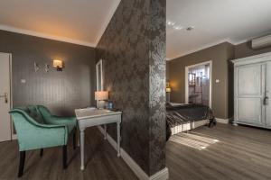 Ein Bett oder Betten in einem Zimmer der Unterkunft Hotel Mardaga