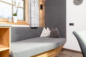 Łóżko lub łóżka w pokoju w obiekcie Chalet Waschkuchl