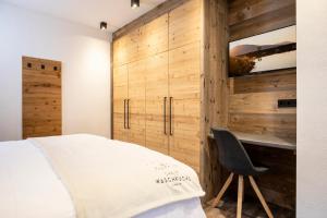 Łóżko lub łóżka w pokoju w obiekcie Chalet Waschkuchl