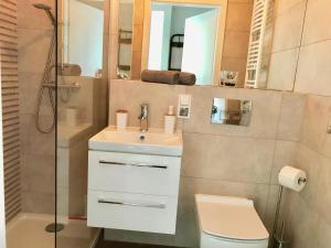 Ένα μπάνιο στο Apartament Antoniny +4 φωτογραφίες