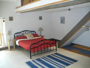 מיטה או מיטות בחדר ב-Stone Cottage