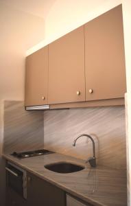 Kitchen o kitchenette sa Studio Candia