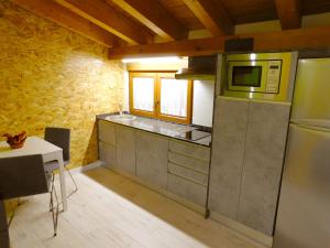 Una cocina o zona de cocina en Apartamento Ribera del Duero Reserva