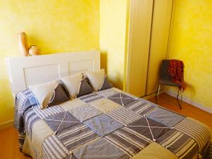Cama o camas de una habitación en Apartamento Ribera del Duero Reserva
