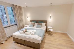 Ein Bett oder Betten in einem Zimmer der Unterkunft Reichel-Appartements