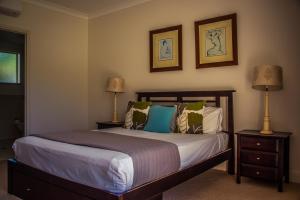 Letto o letti in una camera di Paradise Links Resort Port Douglas