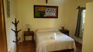 Postel nebo postele na pokoji v ubytování Casa palmito cerca de la playa