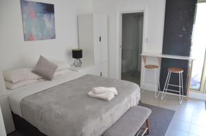 Postel nebo postele na pokoji v ubytování Manly Beach Guesthouse
