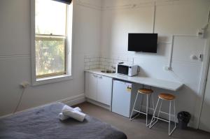 Kuchyň nebo kuchyňský kout v ubytování Manly Beach Guesthouse
