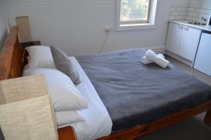 Postel nebo postele na pokoji v ubytování Manly Beach Guesthouse