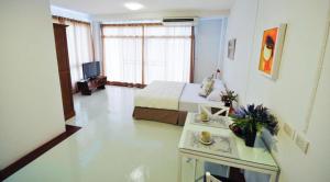Μια τηλεόραση ή/και κέντρο ψυχαγωγίας στο The Meet Green Apartment