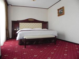 Postel nebo postele na pokoji v ubytování Hestia Hotel + 20 fotografií