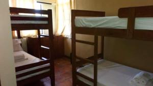 Krevet ili kreveti na kat u jedinici u objektu Makabata Guesthouse