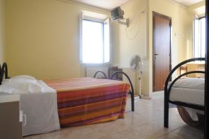 Letto o letti in una camera di Albergo Gino