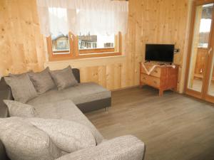 TV a/nebo společenská místnost v ubytování Apartments Resi
