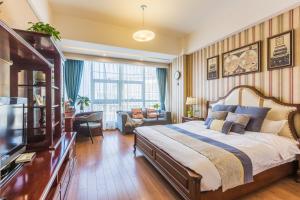 Voodi või voodid majutusasutuse Westlake Service Apartment toas