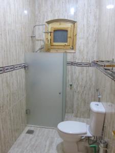 Een badkamer bij Egyptian House