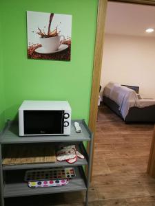 Postel nebo postele na pokoji v ubytování Casa rural Camelle Casa dos avós