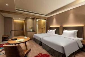 Foto sihtkohas Xinzheng asuva majutusasutuse Ramada Wyndham Zhengzhou Xinzheng galeriist
