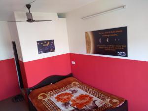 Ένα ή περισσότερα κρεβάτια σε δωμάτιο στο Om sweet Home ॐ