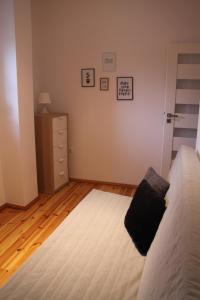 Posteľ alebo postele v izbe v ubytovaní Apartamenty Szabla Bydgoszcz