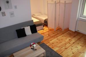 Postel nebo postele na pokoji v ubytování Apartamenty Szabla Bydgoszcz