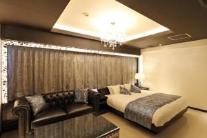 Krevet ili kreveti u jedinici u objektu Hotel Leon Hamamatsu