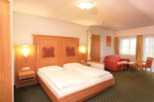 Ένα ή περισσότερα κρεβάτια σε δωμάτιο στο Hotel-Gasthof Beim Böckhiasl