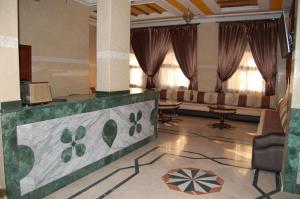 Oleskelutila majoituspaikassa Hotel AMOUDOU فندق أمودو