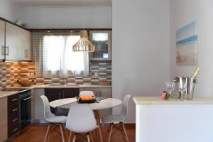 A kitchen or kitchenette at Villa Trifylia