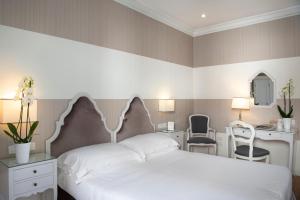 Voodi või voodid majutusasutuse Hotel Rapallo toas