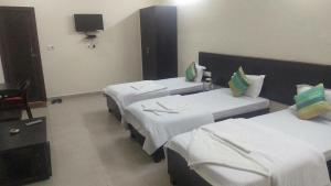 Hotel the Ideal客房内的一张或多张床位