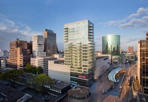 a view of a city with tall buildings at Urban Residences Rotterdam in Rotterdam +50 photos
