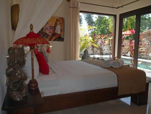 Krevet ili kreveti u jedinici u objektu Hakuna Matata Bali Villas