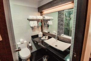 Um banheiro em Hotel Diamond Lima