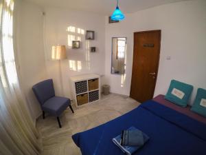 Exodus Hostel & Dive Center客房内的一张或多张床位